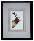 Framed in a walnut colored frame with a hand colored mat.